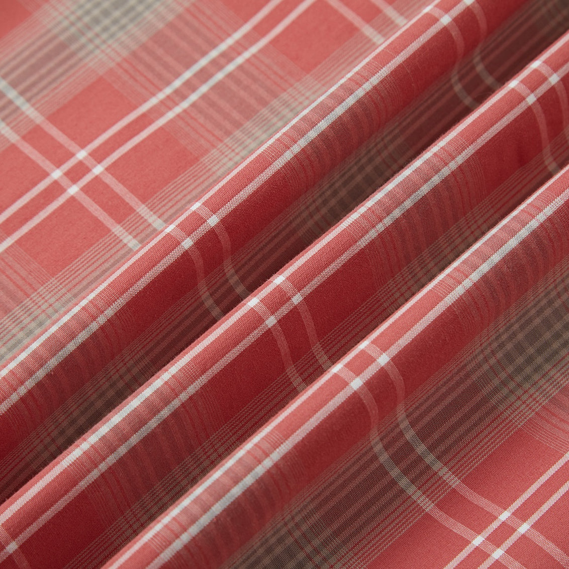Coral and grey plaid men's long-sleeve western pearl snap shirt - fabric detail