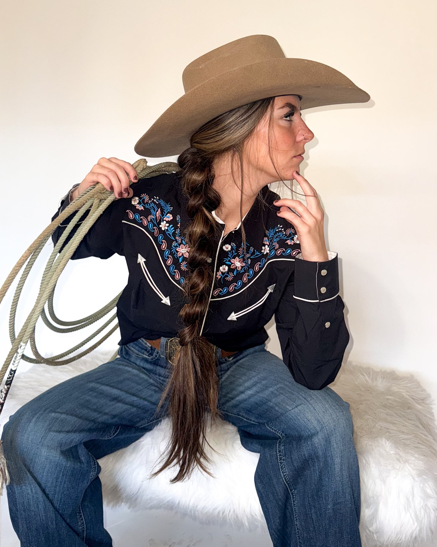Black floral embroidered women's western pearl snap shirt - cowgirl styled look, side