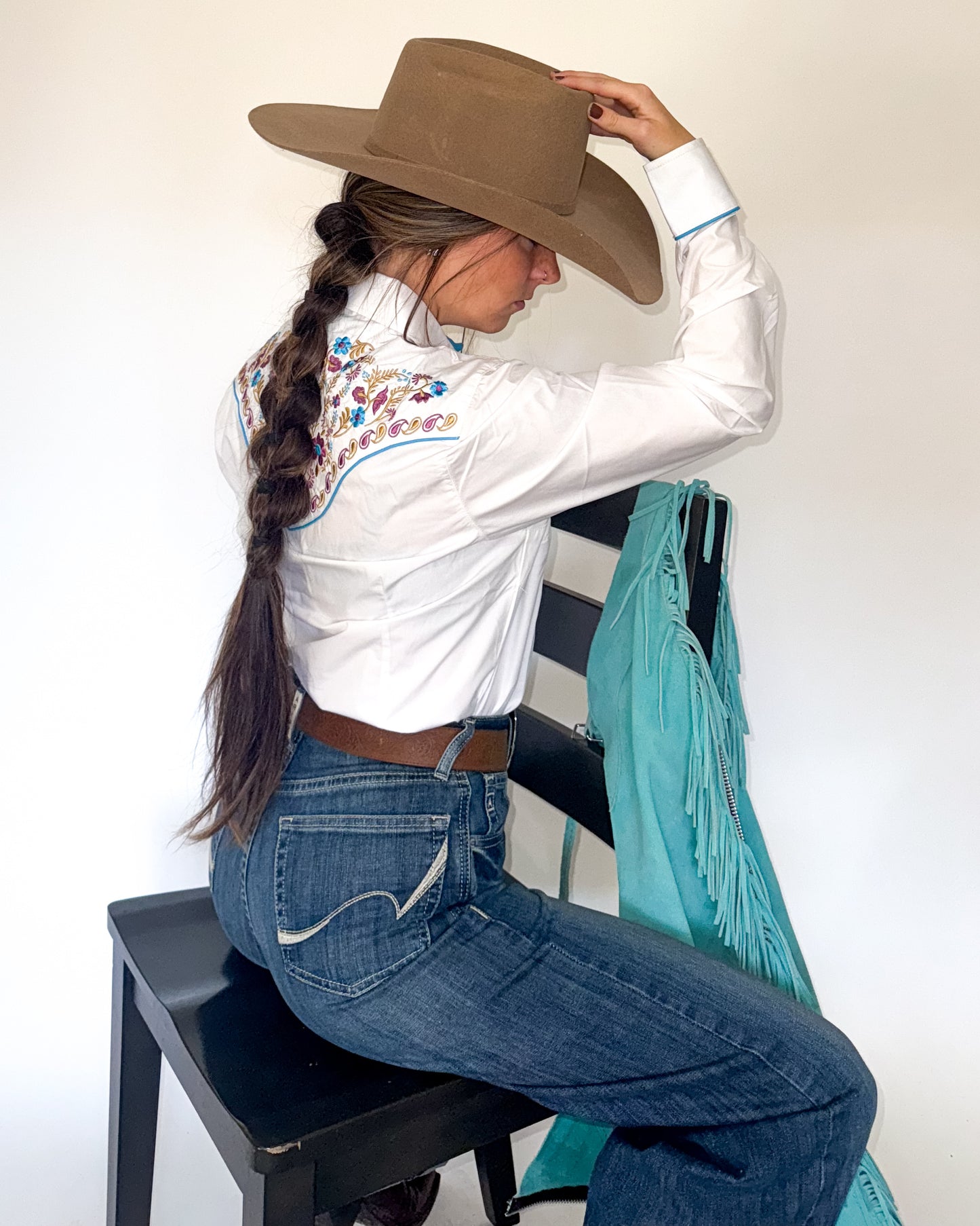 White floral embroidered women's western pearl snap shirt - cowgirl styled look, back detail